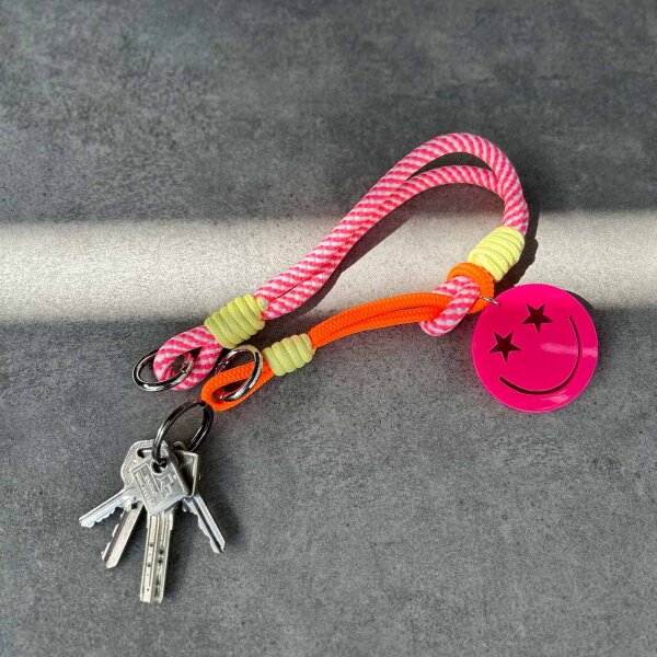 Schlüssel-/Handyband Smiley neonpink